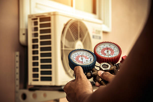 Professional Air Conditioning Service technician working in Belleview, FL
